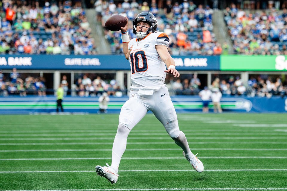 SEATTLE, WASHINGTON - SEPTEMBER 08: Bo Nix #10 of the Denver Broncos looks for a pass during the fourth quarter of the game against the Seattle Seahawks at Lumen Field on September 8, 2024 in Seattle, Washington. (Photo by Jane Gershovich/Getty Images)